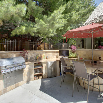 Pool With Patio, Bar, and Hot Tub
