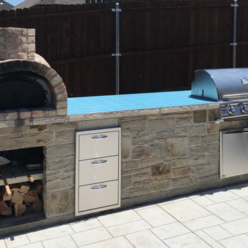 Outdoor kitchen with pizza oven