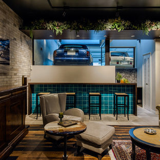 Photo of a contemporary look-out basement with grey walls, painted wood flooring and multi-coloured floors.