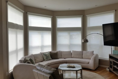 Photo of a mid-sized family room in Boston.
