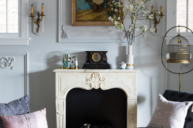 Mid-sized french country enclosed carpeted and gray floor living room library photo in Chicago with green walls, a standard fireplace and no tv