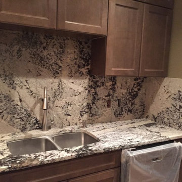 Full height backsplash.. Delicates Granite