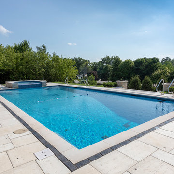 Burr Ridge Lap Pool with Raised Hot Tub and Waterfall
