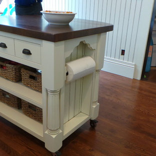 Mid-sized farmhouse kitchen pantry remodeling - Mid-sized farmhouse u-shaped dark wood floor kitchen pantry photo in Columbus with an undermount sink, beaded inset cabinets, light wood cabinets, granite countertops, beige backsplash, ceramic backsplash, stainless steel appliances and an island