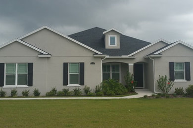 Example of an arts and crafts home design design in Tampa