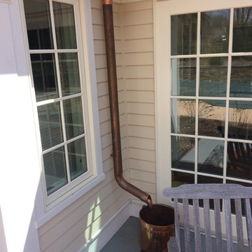 The Roofer's copper Downspouts