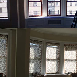 Before and after: Bay windows with interior-mounted custom solar shades - Roller Shades