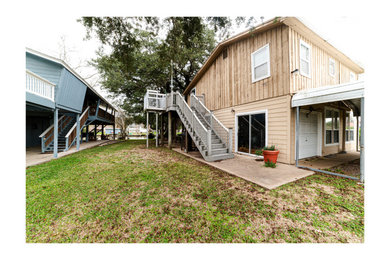 Example of a transitional exterior home design in Houston