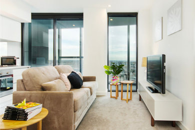 Design ideas for a modern family room in Melbourne.