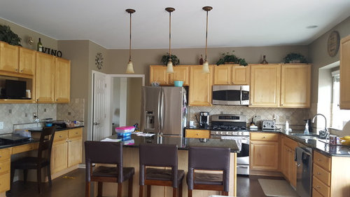 Dining Chandelier Pendant Lights Over Island Should They Match Looking For A Chandelier Pendant Lights Over Our Island Do They Need To Match Kitchen Faucet Is Brushed Nickel So Cabinet Hardware