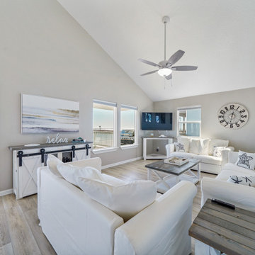 Coastal Home featuring "Castaway Oak" CALI Vinyl flooring.
