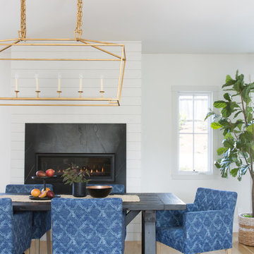 Modern Farmhouse Dining Room with Rustic Wood Table and Boho Chairs