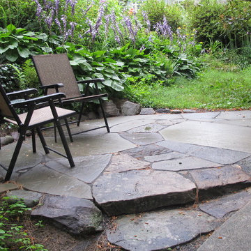 irregular blue stone patio for perinnial garden