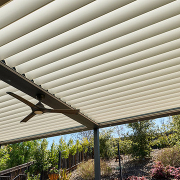 Double Roof Louvered pergola with lighting, fan, and screens