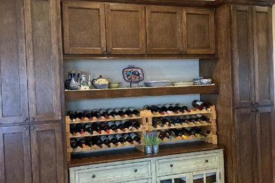 Wine cellar - traditional wine cellar idea in Houston