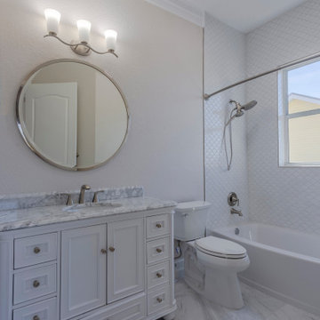 Refined Modern Bathroom with Marble Details and Rainfall Showerhead
