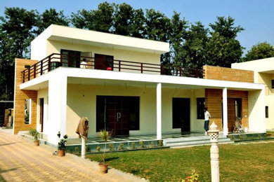 Example of an asian exterior home design in Bengaluru