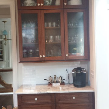 An All-White Kitchen's China Cabinets