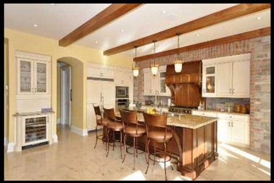Open concept kitchen - mid-sized traditional single-wall beige floor open concept kitchen idea in Toronto with an undermount sink, beaded inset cabinets, white cabinets, granite countertops, gray backsplash, paneled appliances, an island and brown countertops