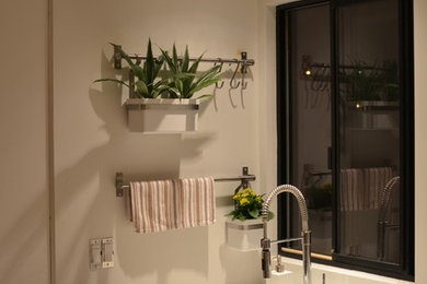 This is an example of a modern laundry room in Los Angeles.