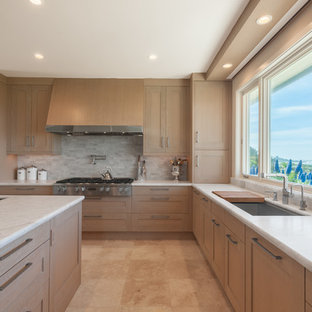 Small transitional u-shaped kitchen pantry in San Francisco with a single-bowl sink, shaker cabinets, light wood cabinets, granite benchtops, grey splashback, cement tile splashback, stainless steel appliances, ceramic floors, with island and beige floor.