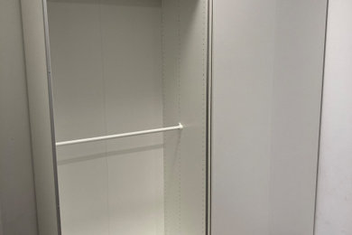 IKEA Pax System with Hasvik Sliding Doors Assembly in a Tight Space - Toronto Co