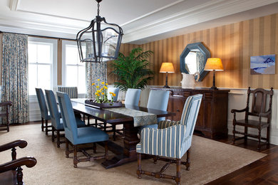 Large elegant dark wood floor enclosed dining room photo in New York with multicolored walls and no fireplace