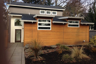 Example of a trendy home design design in Portland