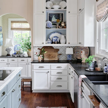 off white painted kitchen cabinets & updated wallpapered spaces