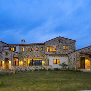 Contemporary Italian Farmhouse by John Siemering Homes Austin TX