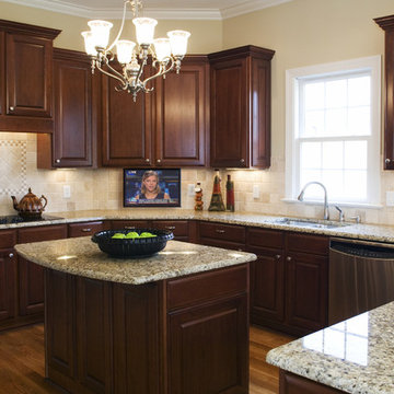 TV Drop Down in Traditional Kitchen
