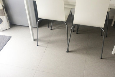 Sleek Modern kitchen with Moderna Light Grey Porcelain Tiles 600x300mm