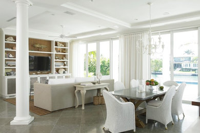 Living room - large transitional open concept limestone floor living room idea in New York with a media wall