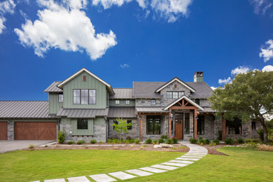 Cottage entryway photo in Austin with a medium wood front door