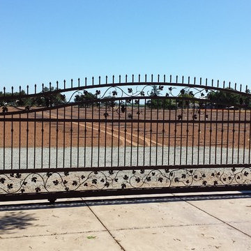 Sliding custom rod iron gate for two cars