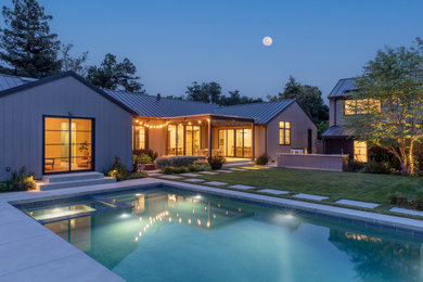 Pool landscaping - mid-sized contemporary backyard concrete pool landscaping idea