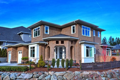 Example of a transitional exterior home design in Seattle