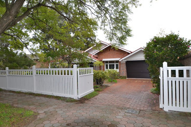 Photo of a traditional home design in Adelaide.