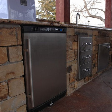 Outdoor Kitchen with Granite Countertops and Massive Open Ceilings