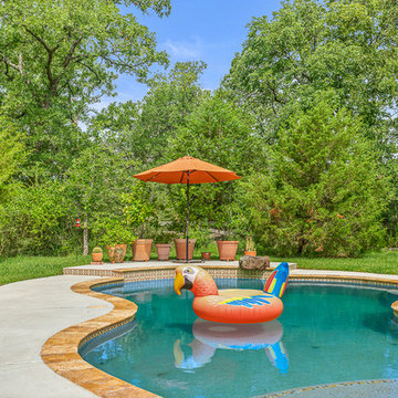 Rustic Pool with Travertine Coping