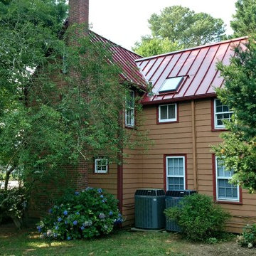 Red Metal Roof and Gutters
