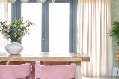 Inspiration for a large contemporary open plan dining room in Essex with green walls, ceramic flooring, grey floors, wallpapered walls and a feature wall.