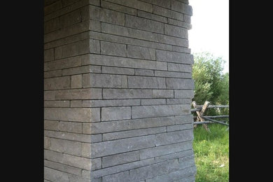 Example of an exterior home design in Other