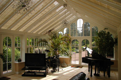Design ideas for a traditional sunroom in West Midlands.
