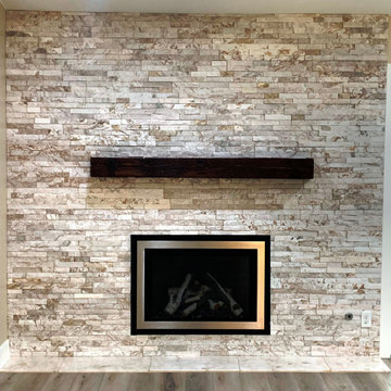 UPDATED FIREPLACE New Stacked Stone, Barn Mantle & Gas Insert