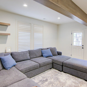 Warm & Inviting Basement Retreat with Kitchenette and Reading Nook
