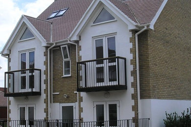 This is an example of a traditional house exterior in Surrey.