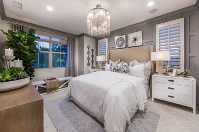 Bedroom - large modern master beige floor and ceramic tile bedroom idea in Orange County with beige walls