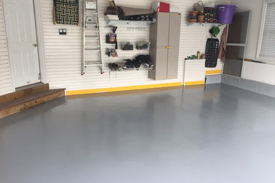 Example of a small attached two-car garage design in New York