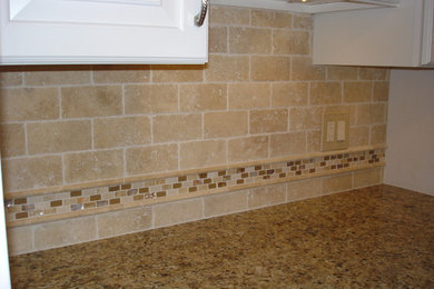 Inspiration for a home bar remodel in New York with an undermount sink, raised-panel cabinets, white cabinets and granite countertops